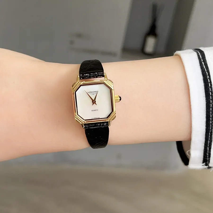 Vintage Longines Black Gold Watch Timeless Elegance