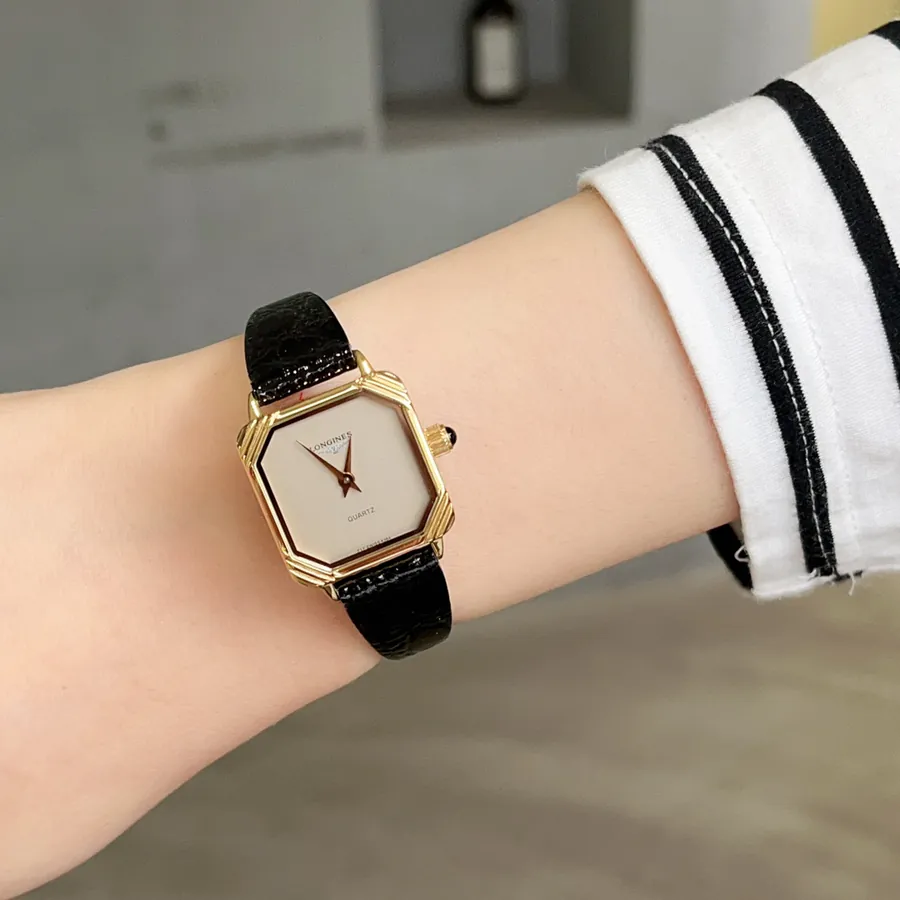 Vintage Longines Black Gold Watch Timeless Elegance