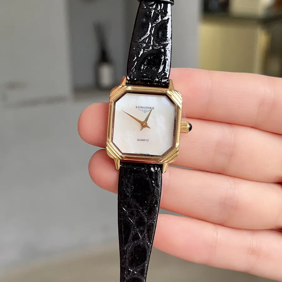 Vintage Longines Black Gold Watch Timeless Elegance